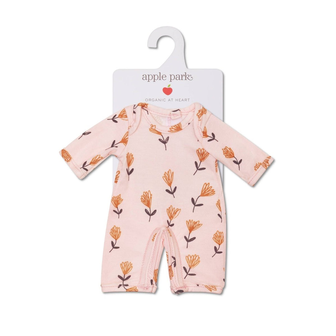 Baby doll romper with floral pattern on a hanger with 'apple park' label.