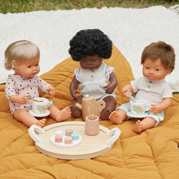 Brunette Baby Doll Boy with Down Syndrome