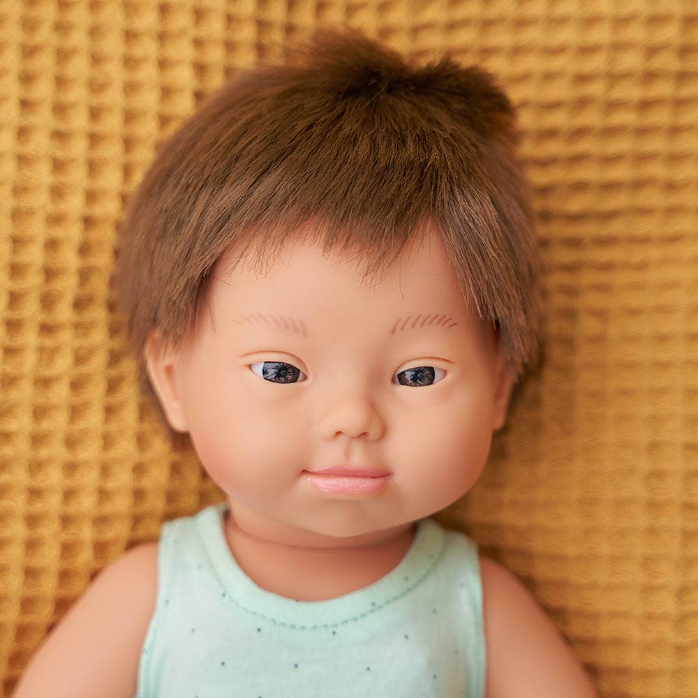 Brunette Baby Doll Boy with Down Syndrome