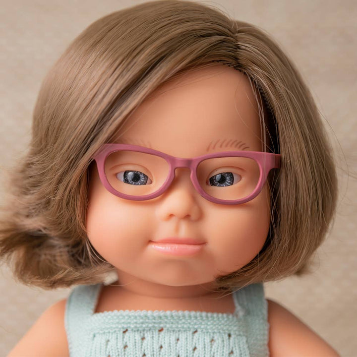 Brunette Baby Doll Girl with Down Syndrome