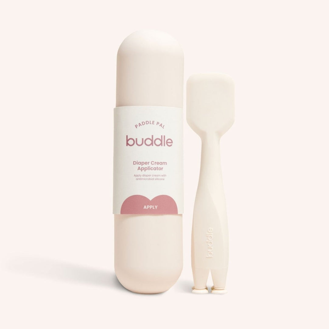 Buddle diaper cream applicator with packaging on a white background