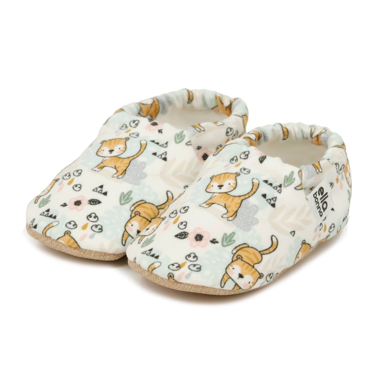 Pair of baby shoes with kitten pattern on a white background