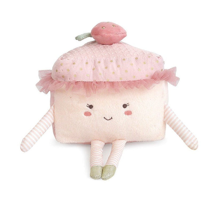 Plush toy shaped like a cupcake with a smiling face on a white background