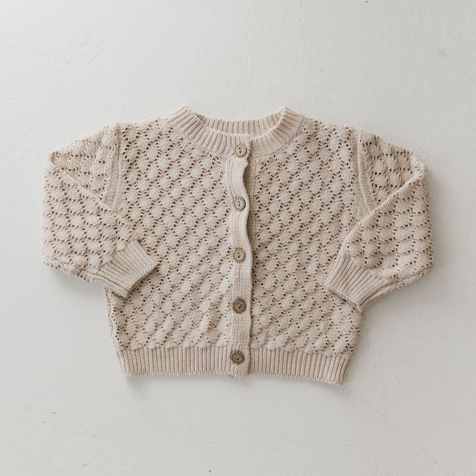 Knitted cardigan on a white background