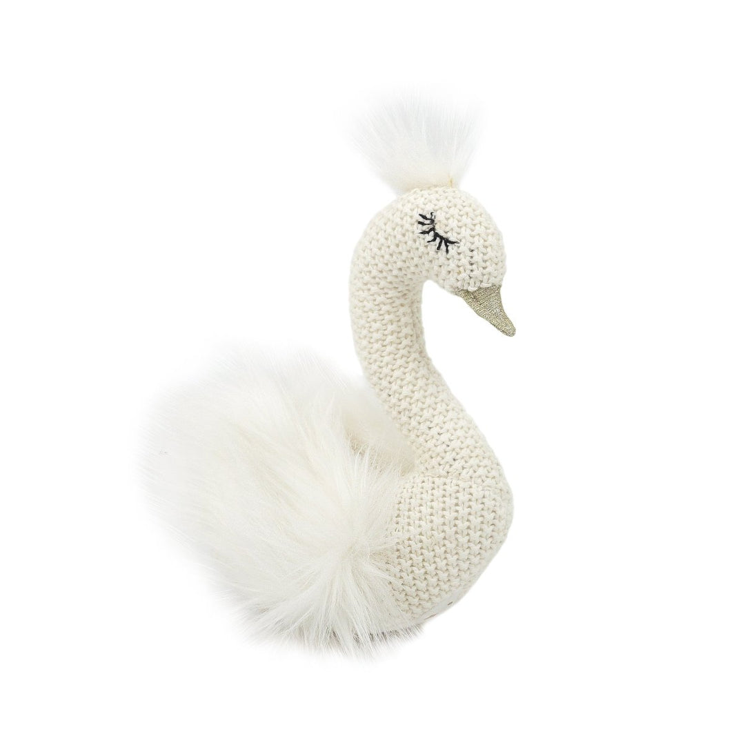 White swan-shaped plush toy with fluffy texture on a white background
