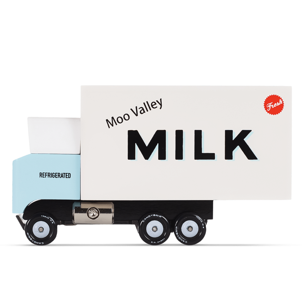 A toy milk truck with a light blue cab and a white cargo box printed with &
