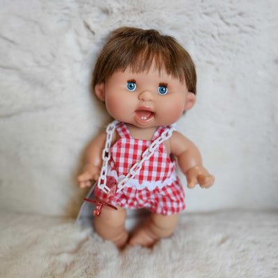 Pepote baby boy doll with a red checkered outfit 
