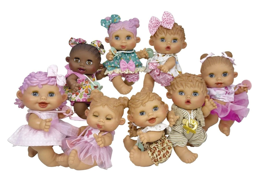 Set of baby dolls with different hairstyles and outfits, featuring the brand &