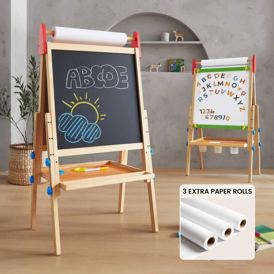Wooden children's easel with chalkboard and whiteboard surfaces, featuring alphabet and numbers, in a room setting.