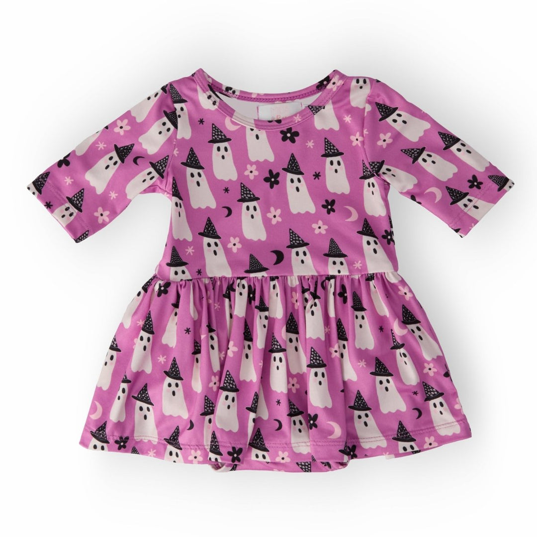 Pink dress with ghost pattern on a white background