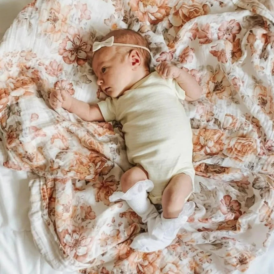 Muslin Swaddle Sunset Floral Baby Blanket | Mini Wander LLC | Bee Like Kids